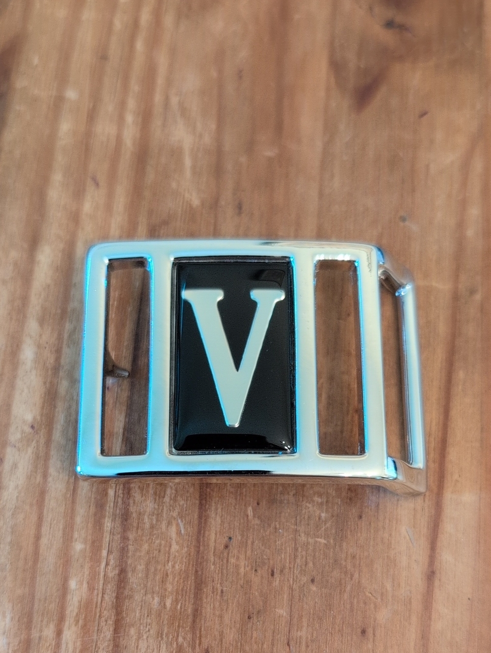 Vintage Avon Silver Tone And Black Initial "V" Belt Buckle, 2" W x 1.5"H